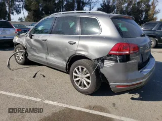 2016 Volkswagen Touareg Sport с VIN WVGEF9BP0GD012604, выставлен на аукционе Copart как лот 85132214 с пробегом 127 155 миль миль и Чистый • Clean title. История ставок и продаж доступна на DreamBid. Изображение 2.
