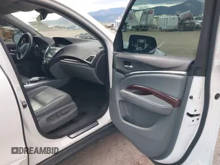 2016 Acura MDX w/Advance with VIN 5FRYD4H91GB034993, listed as a IAAI auction lot 40623678 with 88,027 mi miles. Bid and sale history available at carsss.com. Image 5.