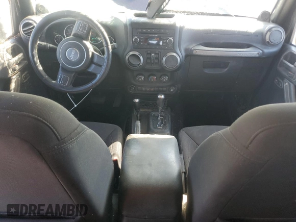 2014 Jeep Wrangler Unlimited Sport with VIN 1C4BJWDG9EL250326, listed as a Copart auction lot 48545705 with 247,460 mi miles and Salvage Title. Bid and sale history available at DreamBid. Image 8.