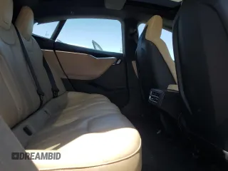 2016 Tesla Model S 90D с VIN 5YJSA1E23GF144496, выставлен на аукционе Copart как лот 64080845 с пробегом 34 847 миль миль и Списание • Salvage title. История ставок и продаж доступна на DreamBid. Изображение 10.