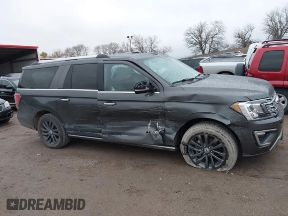 2020 Ford Expedition Max Limited z VIN 1FMJK2ATXLEA94734, wystawiony jako IAAI lot #40774843 z przebiegiem 65 457 mil mil oraz . Historia ofert i sprzedaży dostępna na DreamBid. Obrazek 13.