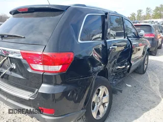 2013 Jeep Grand Cherokee Limited with VIN 1C4RJEBGXDC520609, listed as a IAAI auction lot 41493503 with 173,020 mi miles. Bid and sale history available at carsss.com. Image 6.