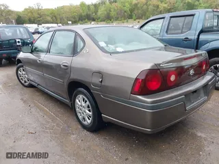 2003 Chevrolet Impala with VIN 2G1WF52E539108339, listed as a IAAI auction lot 42021882 with 216,548 mi miles. Bid and sale history available at carsss.com. Image 3.