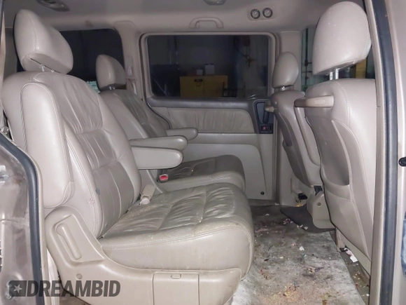 2003 Honda Odyssey EX-L with VIN 5FNRL18923B117592, listed as a IAAI auction lot 41546119 with 212,755 mi miles and . Bid and sale history available at DreamBid. Image 8.