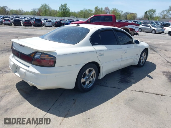 2003 Pontiac Bonneville SLE z VIN 1G2HY52K134202421, wystawiony jako IAAI lot #42136163 z przebiegiem Nie podano mil oraz . Historia ofert i sprzedaży dostępna na DreamBid. Obrazek 4.