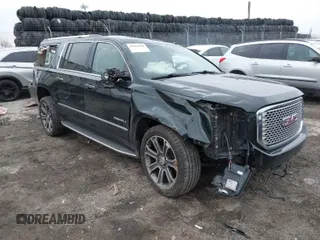 2016 GMC Yukon XL Denali with VIN 1GKS2HKJ8GR406450, listed as a IAAI auction lot 41661050 with 125,830 mi miles. Bid and sale history available at carsss.com. Image 1.
