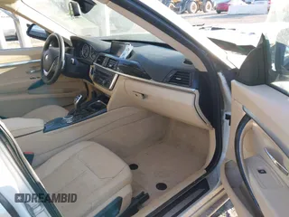 2015 BMW 3 Series 328i Gran Turismo xDrive with VIN WBA3X5C54FD562088, listed as a IAAI auction lot 41894595 with Not provided miles and . Bid and sale history available at DreamBid. Image 5.