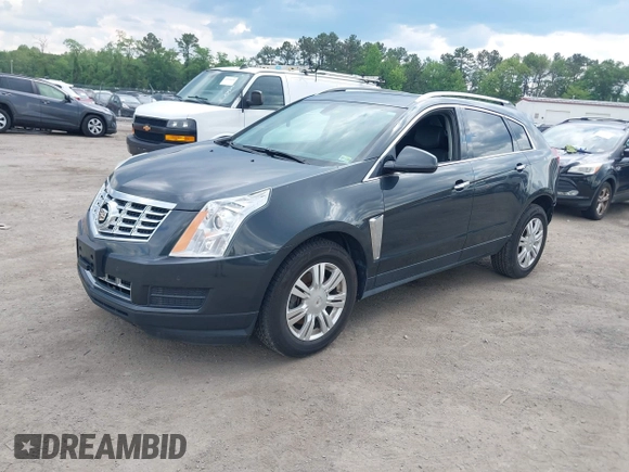 2014 Cadillac SRX Luxury Collection z VIN 3GYFNEE38ES626949, wystawiony jako IAAI lot #42194679 z przebiegiem 173 303 mil mil oraz . Historia ofert i sprzedaży dostępna na DreamBid. Obrazek 2.