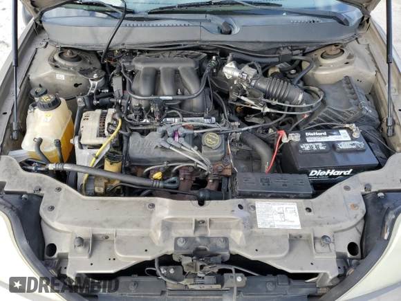 2004 Mercury Sable GS z VIN 1MEFM50U24A617431, wystawiony jako Copart lot #88352715 z przebiegiem 141 457 mil mil oraz Szkody całkowita. Historia ofert i sprzedaży dostępna na DreamBid. Obrazek 12.