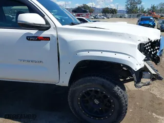 2019 Toyota Tacoma 4WD SR with VIN 3TMCZ5AN3KM207007, listed as a IAAI auction lot 41755529 with 43,203 mi miles. Bid and sale history available at carsss.com. Image 17.