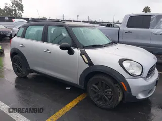 2015 MINI Countryman with VIN WMWZB3C52FWR45805, listed as a IAAI auction lot 41784638 with 41,204 mi miles and . Bid and sale history available at DreamBid. Image 1.