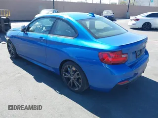 2015 BMW 2 Series M235i with VIN WBA1J7C59FV254140, listed as a IAAI auction lot 41642427 with 23,957 mi miles and . Bid and sale history available at carsss.com. Image 3.