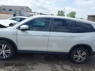 2017 Honda Pilot EX-L with VIN 5FNYF6H5XHB005000, listed as a IAAI auction lot 42039832 with 141,592 mi miles and . Bid and sale history available at DreamBid. Image 15.