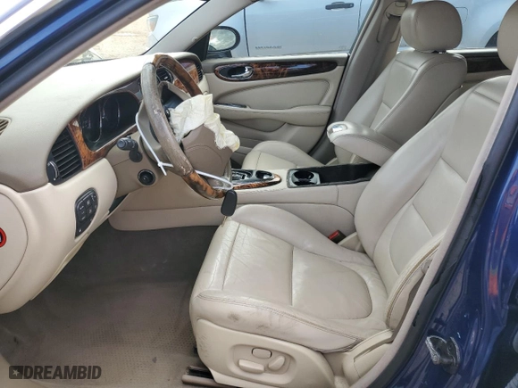 2004 Jaguar XJ with VIN SAJWA71C34SG19800, listed as a Copart auction lot 71877194 with 157,051 mi miles and Salvage Title. Bid and sale history available at carsss.com. Image 7.
