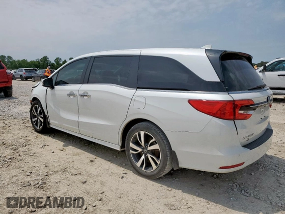 2023 Honda Odyssey Touring с VIN 5FNRL6H8XPB001311, выставлен на аукционе Copart как лот 56924345 с пробегом 77 736 миль миль и Списание • Salvage title. История ставок и продаж доступна на DreamBid. Изображение 2.