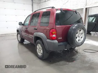 2002 Jeep Liberty Sport with VIN 1J4GL48K72W115630, listed as a IAAI auction lot 41973816 with 154,220 mi miles. Bid and sale history available at carsss.com. Image 3.