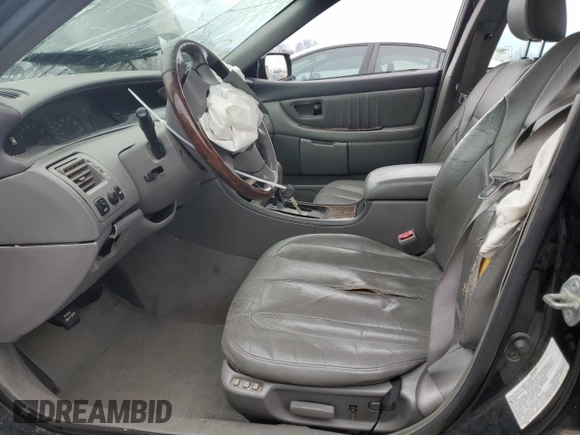 2003 Toyota Avalon XL z VIN 4T1BF28B03U326172, wystawiony jako Copart lot #44729485 z przebiegiem Nie podano mil oraz Nie do naprawy • Non repairable. Historia ofert i sprzedaży dostępna na DreamBid. Obrazek 7.