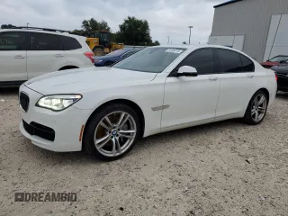 2013 BMW 7 Series 750i with VIN WBAYA8C54DC996569, listed as a Copart auction lot 74199774 with 107,871 mi miles and Salvage Title. Bid and sale history available at DreamBid. Image 1.