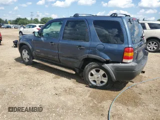 2001 Ford Escape XLT z VIN 1FMYU04111KB13287, wystawiony jako Copart lot #62183415 z przebiegiem 237 142 mil mil oraz Szkoda całkowita • Salvage title. Historia ofert i sprzedaży dostępna na DreamBid. Obrazek 2.