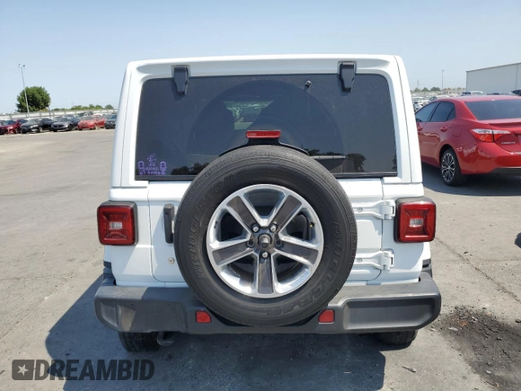 2018 Jeep Wrangler Unlimited Sahara с VIN 1C4HJXEG5JW303515, выставлен на аукционе Copart как лот 59985005 с пробегом 58 628 миль миль и Списание • Salvage title. История ставок и продаж доступна на DreamBid. Изображение 6.