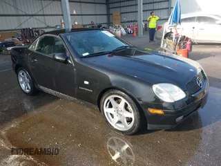 2000 Mercedes-Benz SLK-Class Kompressor with VIN WDBKK47F6YF165062, listed as a IAAI auction lot 42028279 with 105,707 mi miles. Bid and sale history available at carsss.com. Image 1.