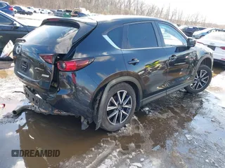 2018 Mazda CX-5 Touring with VIN JM3KFBCM2J0451828, listed as a IAAI auction lot 41531728 with 88,939 mi miles. Bid and sale history available at carsss.com. Image 4.