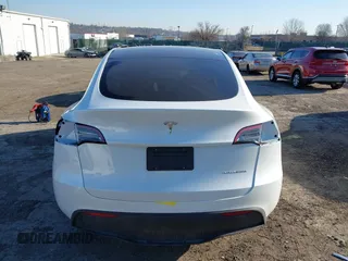 2023 Tesla Model Y Long Range z VIN 7SAYGDEE5PF765326, wystawiony jako IAAI lot #41757113 z przebiegiem 10 461 mil mil oraz . Historia ofert i sprzedaży dostępna na DreamBid. Obrazek 17.