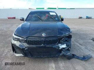 2022 BMW 3 Series M340i xDrive with VIN WBA5U9C08NFM68599, listed as a IAAI auction lot 41260340 with Not Provided miles and . Bid and sale history available at DreamBid. Image 12.