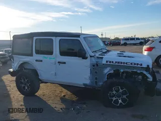 2022 Jeep Wrangler Unlimited Rubicon with VIN 1C4HJXFN4NW123803, listed as a IAAI auction lot 40994742 with 36,156 mi miles and . Bid and sale history available at DreamBid. Image 13.