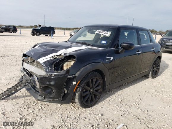 2021 MINI Hardtop 4 Door Oxford Edition with VIN WMWXU7C09M2N79553, listed as a Copart auction lot 84939724 with 59,139 mi miles and Salvage Title. Bid and sale history available at carsss.com. Image 1.
