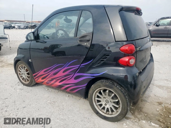 2011 Smart fortwo Pure with VIN WMEEJ3BA4BK447028, listed as a Copart auction lot 57359265 with 84,657 mi miles and Clean title. Bid and sale history available at DreamBid. Image 2.