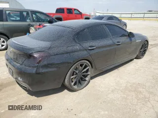 2016 BMW 6 Series 650i xDrive z VIN WBA6D6C57GG388027, wystawiony jako Copart lot #53157535 z przebiegiem 52 147 mil mil oraz Szkody całkowita. Historia ofert i sprzedaży dostępna na DreamBid. Obrazek 3.