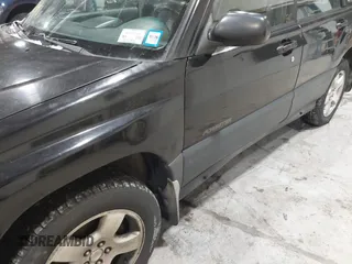 1998 Subaru Forester L with VIN JF1SF6353WH776091, listed as a IAAI auction lot 41573799 with 170,851 mi miles. Bid and sale history available at carsss.com. Image 12.