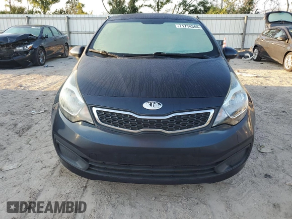2014 Kia Rio EX with VIN KNADN4A39E6325590, listed as a Copart auction lot 71774344 with 90,785 mi miles and Salvage Title. Bid and sale history available at carsss.com. Image 5.