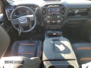 2022 GMC Sierra 1500 with VIN ME7702, listed as a Copart auction lot 77133414 with 40,336 mi miles and Salvage Title. Bid and sale history available at DreamBid. Image 8.