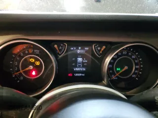 2020 Jeep Wrangler Unlimited Black and Tan with VIN 1C4HJXDG9LW331418, listed as a Copart auction lot 56414765 with 125,339 mi miles and Salvage title. Bid and sale history available at DreamBid. Image 9.