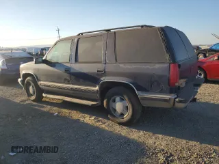 1999 GMC Yukon with VIN 1GKEK13RXXJ748733, listed as a Copart auction lot 74125914 with 172,766 mi miles and Clean Title. Bid and sale history available at carsss.com. Image 2.
