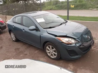 2011 Mazda 3 i Touring z VIN JM1BL1VFXB1455504, wystawiony jako IAAI lot #42395140 z przebiegiem 99 508 mil mil oraz . Historia ofert i sprzedaży dostępna na DreamBid. Obrazek 1.