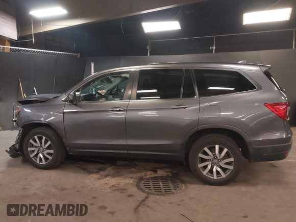 2019 Honda Pilot EX-L with VIN 5FNYF6H57KB062293, listed as a IAAI auction lot 41936964 with 93,012 mi miles and . Bid and sale history available at DreamBid. Image 14.