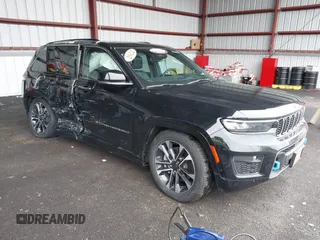 2022 Jeep Grand Cherokee Overland z VIN 1C4RJYD66N8715407, wystawiony jako IAAI lot #41807012 z przebiegiem 11 488 mil mil oraz . Historia ofert i sprzedaży dostępna na DreamBid. Obrazek 1.