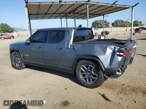 2024 Rivian R1T Adventure with VIN 7FCTGBAA1RN032543, listed as a Copart auction lot 69800484 with Not Provided miles and Salvage Title. Bid and sale history available at carsss.com. Image 2.