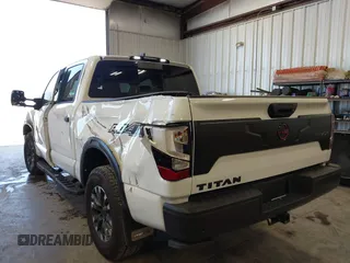 2024 Nissan Titan Pro-4X with VIN 1N6AA1ED0RN112314, listed as a IAAI auction lot 42465520 with 8,711 mi miles and . Bid and sale history available at DreamBid. Image 3.