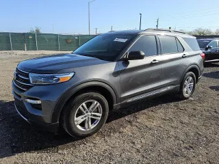 2022 Ford Explorer XLT with VIN 1FMSK8DH7NGA82496, listed as a Copart auction lot 51866865 with 77,014 mi miles and Clean Title. Bid and sale history available at carsss.com. Image 1.