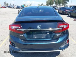 2018 Honda Clarity Touring with VIN JHMZC5F39JC022655, listed as a IAAI auction lot 42149002 with 118,913 mi miles. Bid and sale history available at carsss.com. Image 16.