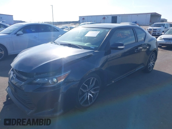 2015 Scion tC with VIN JTKJF5C71F3090963, listed as a IAAI auction lot 41802183 with 107,650 mi miles. Bid and sale history available at carsss.com. Image 17.