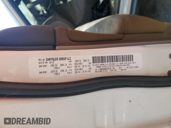 2011 Jeep Grand Cherokee Laredo with VIN 1J4RR4GG8BC572470, listed as a Copart auction lot 64953985 with 171,777 mi miles and Clean title. Bid and sale history available at DreamBid. Image 13.
