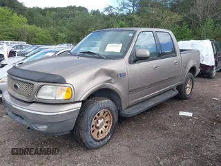 2003 Ford F-150 XLT with VIN 1FTRW08L63KD06455, listed as a IAAI auction lot 41988549 with 138,168 mi miles. Bid and sale history available at carsss.com. Image 6.