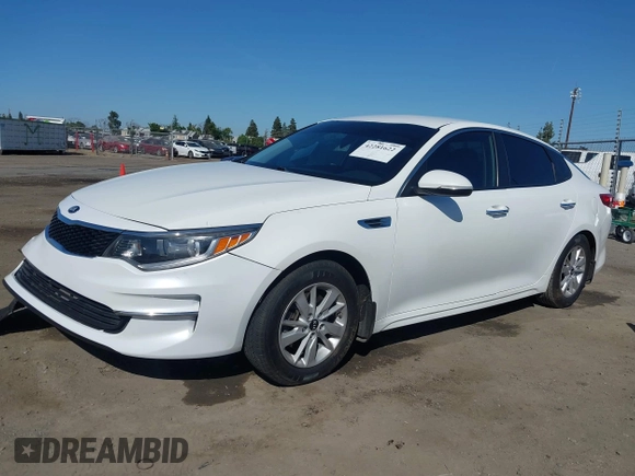 2016 Kia Optima LX with VIN KNAGT4L31G5075416, listed as a IAAI auction lot 42281622 with 125,971 mi miles and . Bid and sale history available at DreamBid. Image 14.
