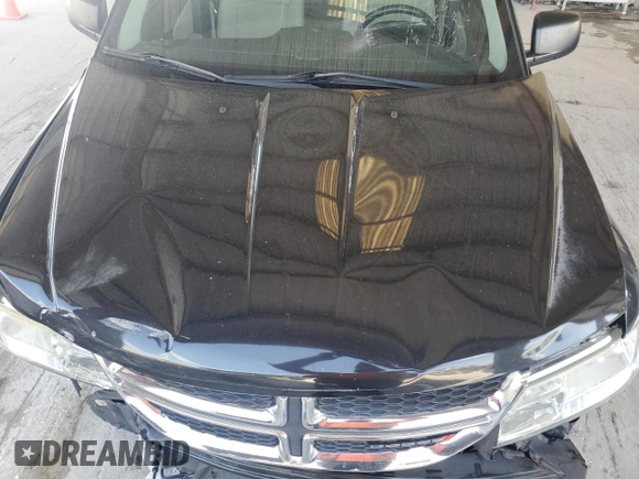 2013 Dodge Journey American Value with VIN 3C4PDCAB2DT684871, listed as a Copart auction lot 52288915 with 119,569 mi miles and Salvage title. Bid and sale history available at DreamBid. Image 12.