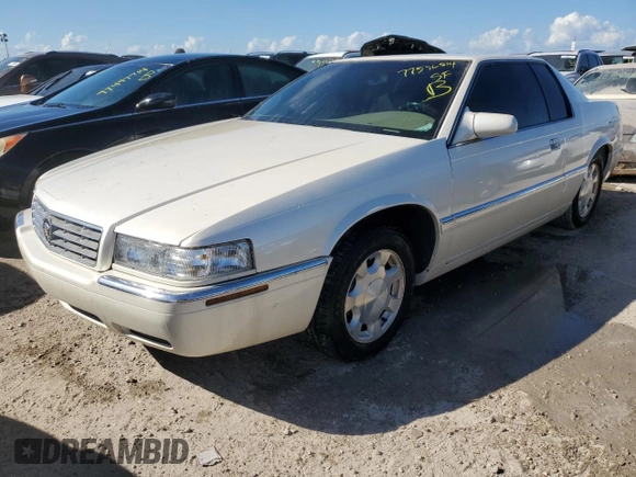 2000 Cadillac Eldorado z VIN 1G6EL12Y0YB704658, wystawiony jako Copart lot #77596814 z przebiegiem Nie podano mil oraz Nie do naprawy • Non repairable. Historia ofert i sprzedaży dostępna na DreamBid. Obrazek 1.